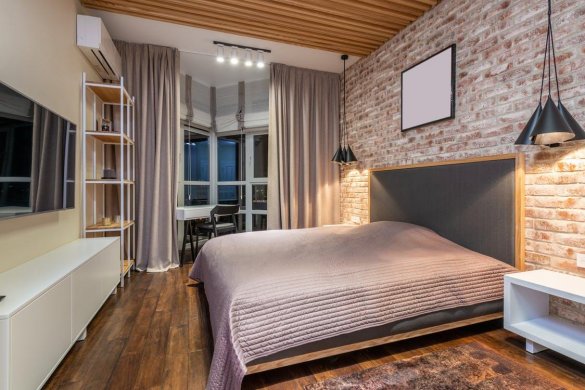 Bedroom interior with furniture and TV in flat