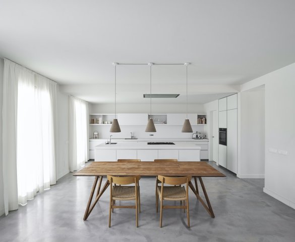 brown wooden table with chairs