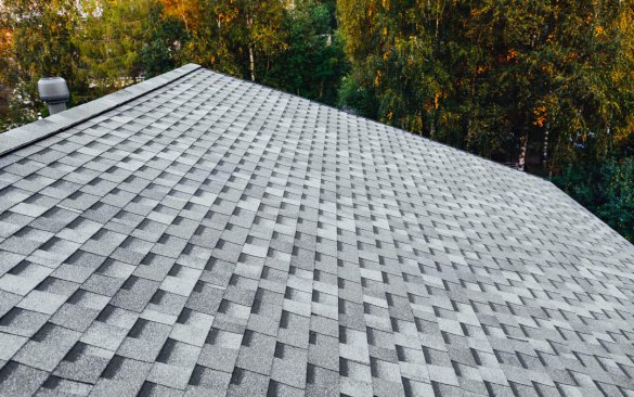 new renovated roof with shingles flat polymeric roof-tiles