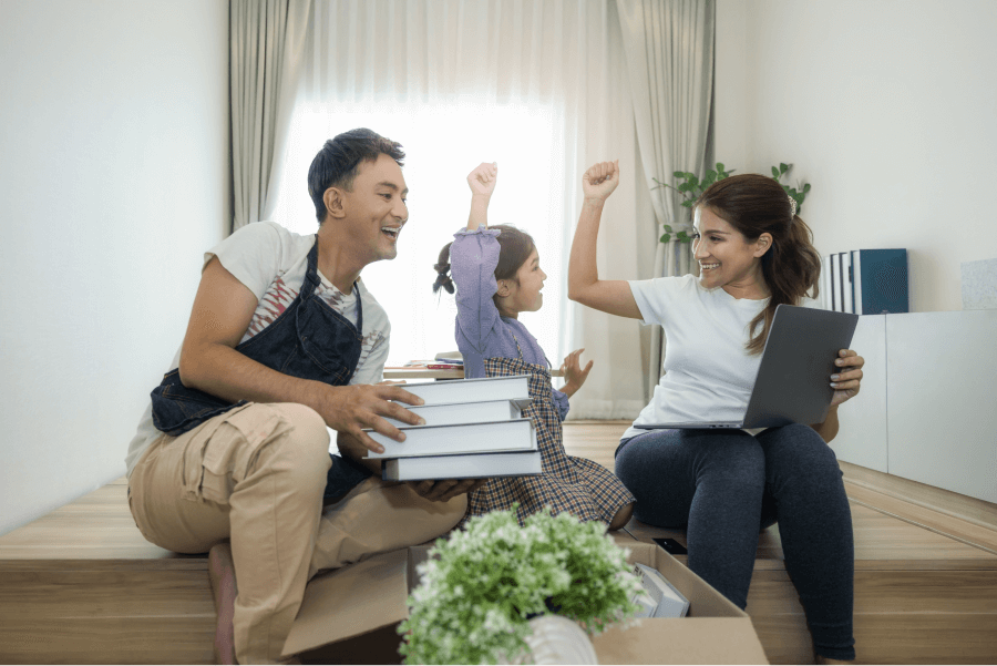 Family decluttering the house together