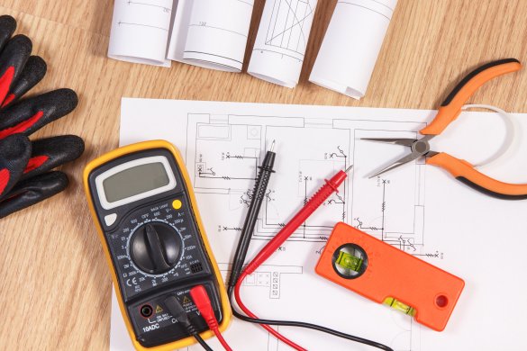 Electrical diagrams, multimeter for measurement in electrical installation and accessories for engineer jobs