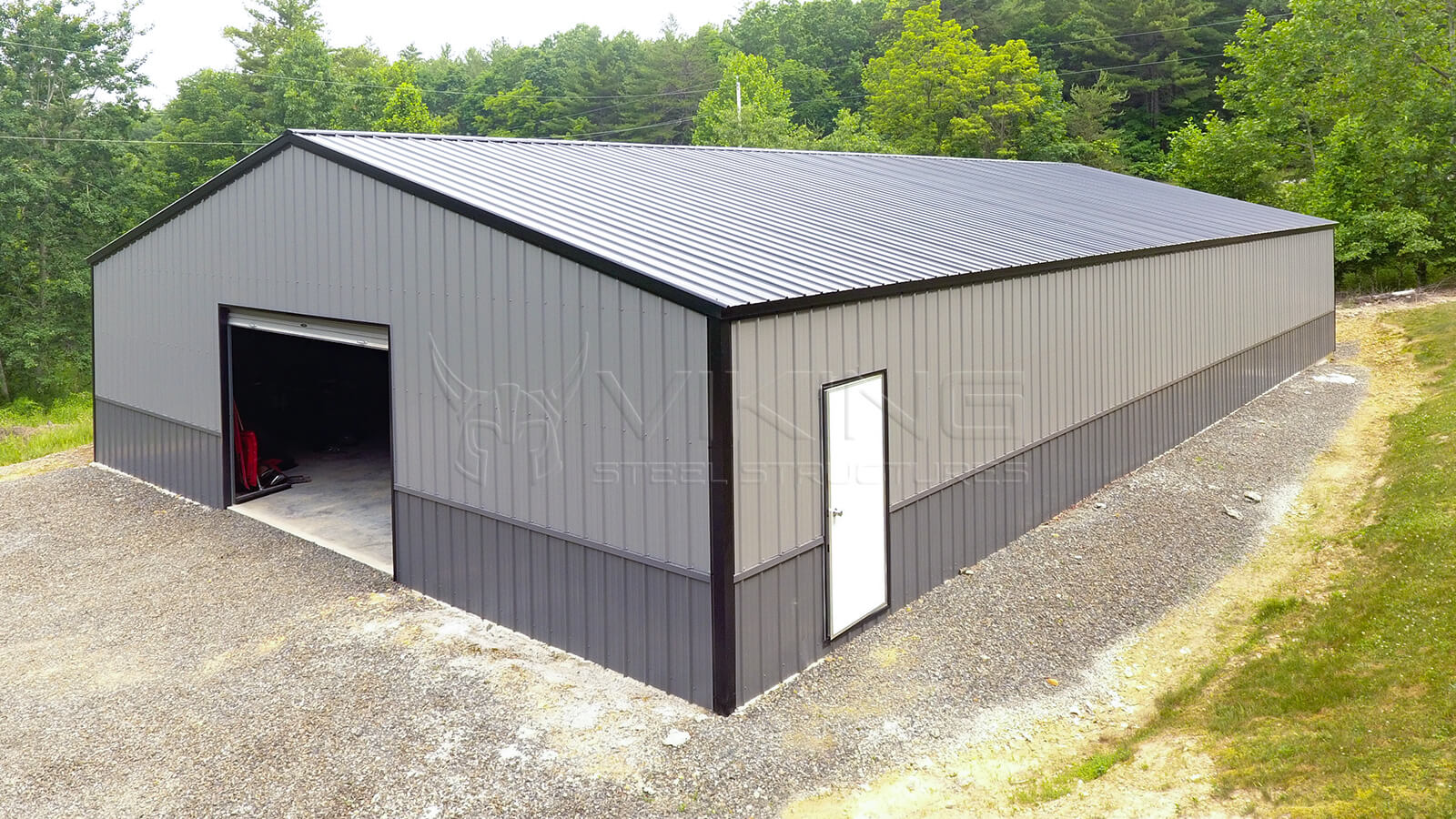 How do you install steel building kits, and what do they contain?