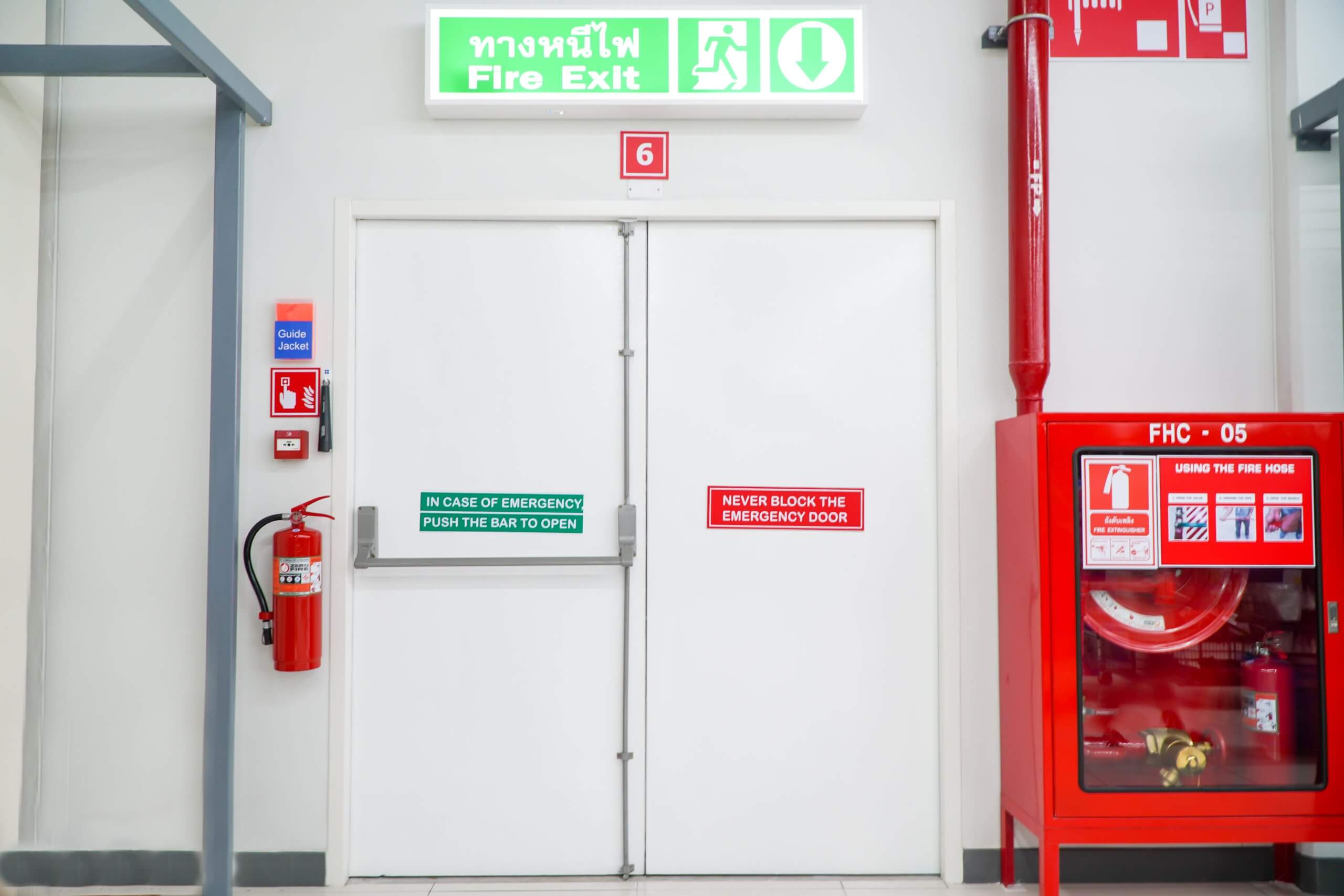 Building Emergency Exit with Exit Sign and Fire Extinguisher,fire protection concept