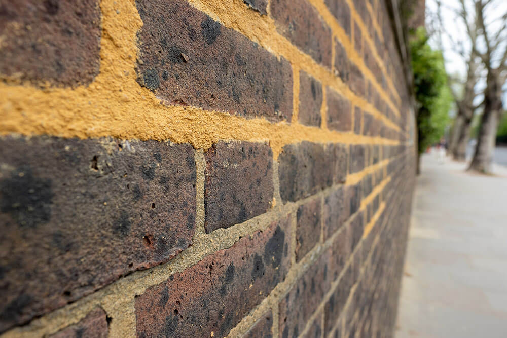How Does Repointing Brick Prevent Water Damage and Leaks?